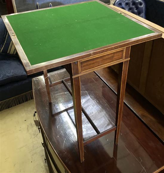 An Edwardian satinwood banded mahogany folding card table, width 53cm, depth 26cm, height 65cm